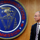 Federal Communications Commission (FCC) Commissioner Brendan Carr answers a question from the media after an FCC meeting to vote on net neutrality, Thursday, Dec. 14, 2017, in Washington.